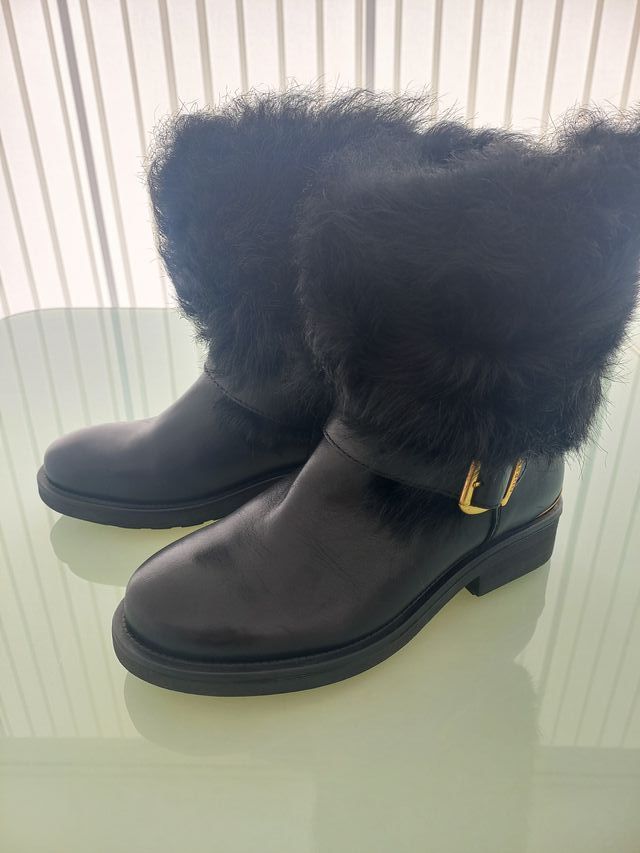 Guess Botas de Piel para mujer.