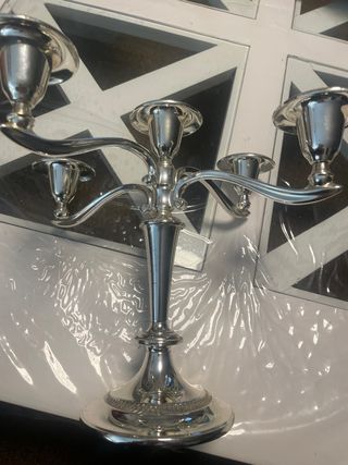 candelabros , bañados en plata