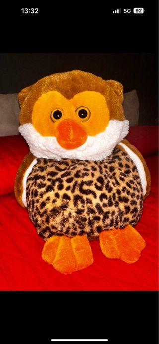 Peluche con tasca posteriore