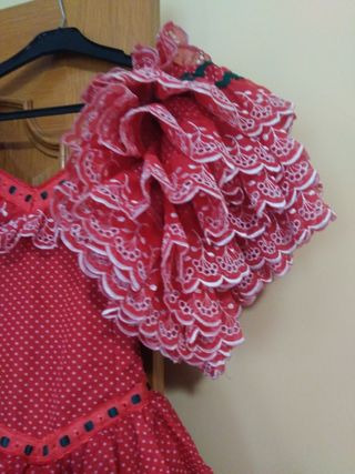 Traje de sevillana o flamenca de Maria I. Ruiz, Es