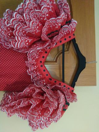 Traje de sevillana o flamenca de Maria I. Ruiz, Es