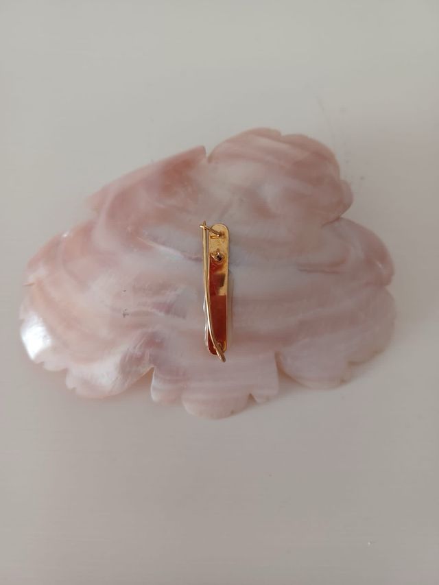 broche en nacar y oro