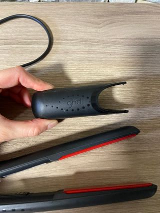 piastra capelli gold V GHD / nera e rossa