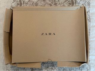 Botas altas piel marrón Zara. 