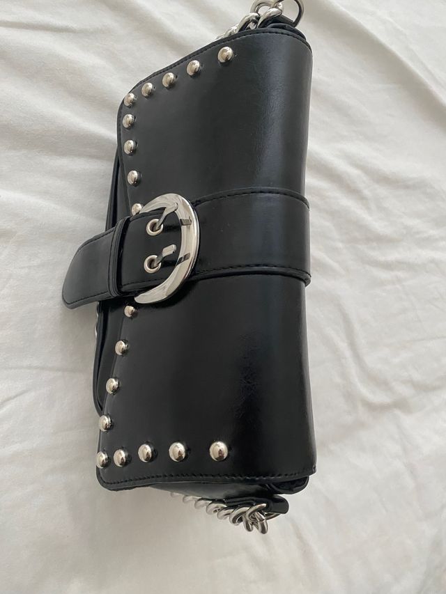 Bolso negro, nuevo-divino y actual