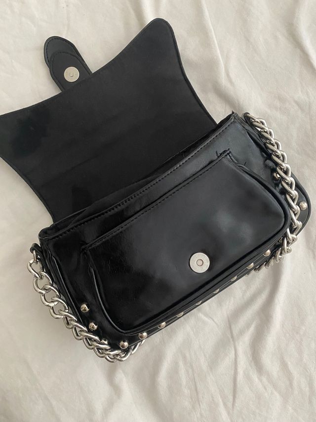 Bolso negro, nuevo-divino y actual