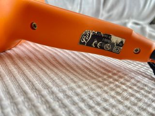 Secador viaje naranja.