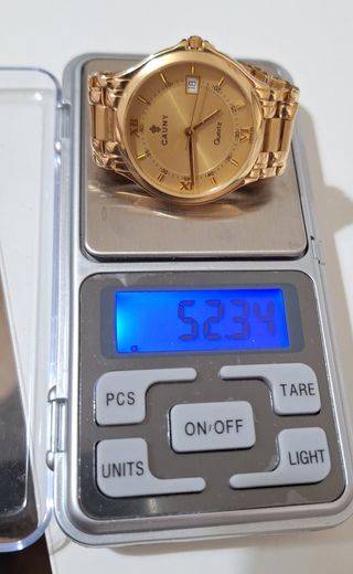 Reloj Cauny oro 18k