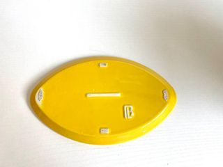 Piatto da portata giallo in ceramica