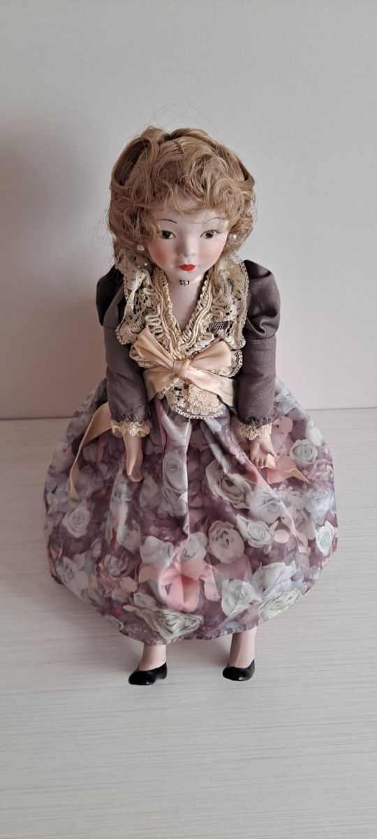 Lote 5 muñecas porcelana.