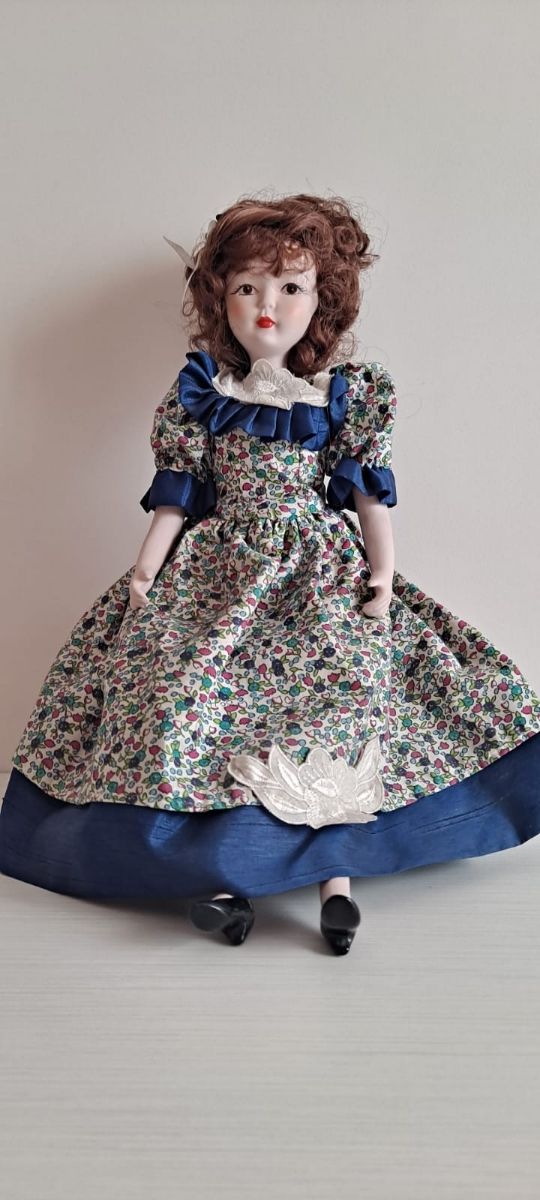 Lote 5 muñecas porcelana.