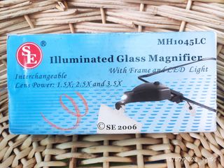 Occhiali con clips da ingrandimento