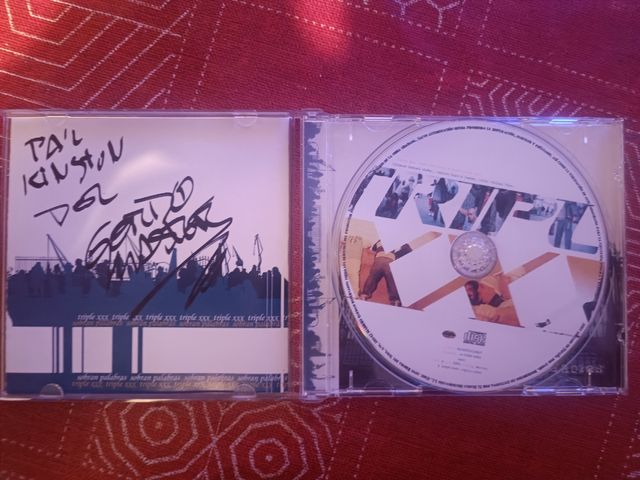 Triple xxx album firmado sobran palabras