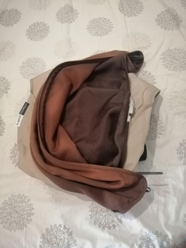 El carro y la funda de lluvia