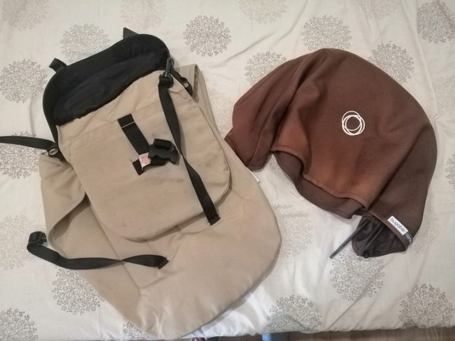 El carro y la funda de lluvia