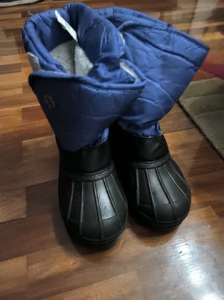 Botas niño descanso nieve