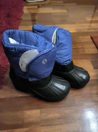 Botas niño descanso nieve