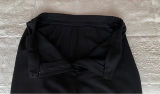 Pantalón negro de pinzas de lanilla mujer