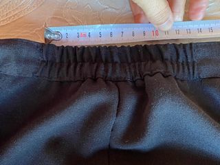 Pantalón negro de pinzas de lanilla mujer