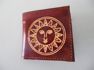 Bolso hippie, cartera y espejo.