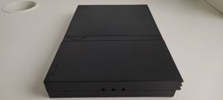 Playstation 2 con mando, cables y dos memory cards