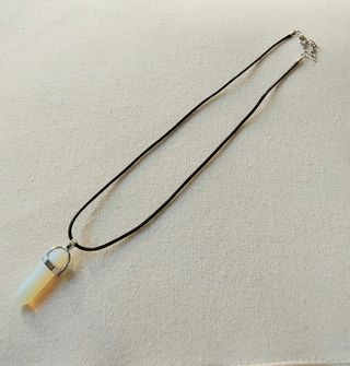 Collar y colgante péndulo