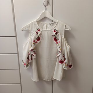 Blusa blanca volantes