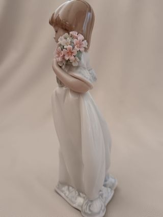 Porcelanas Lladró niño béisbol y niña flores