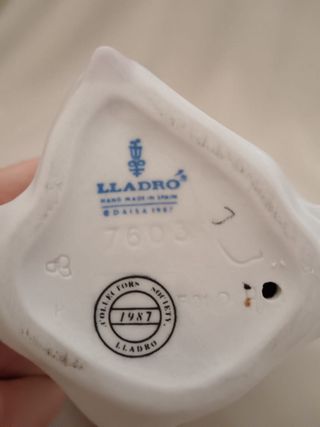 Porcelanas Lladró niño béisbol y niña flores