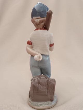 Porcelanas Lladró niño béisbol y niña flores