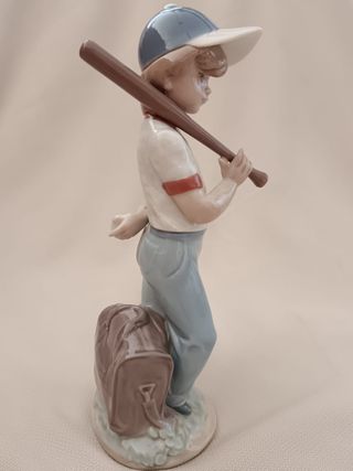 Porcelanas Lladró niño béisbol y niña flores