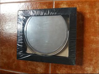 Espejo redondo extensible.