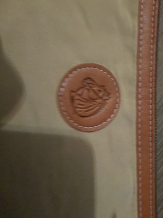 Cartera de mano.