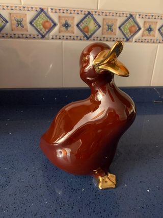 Figura pato, detalles oro de ley