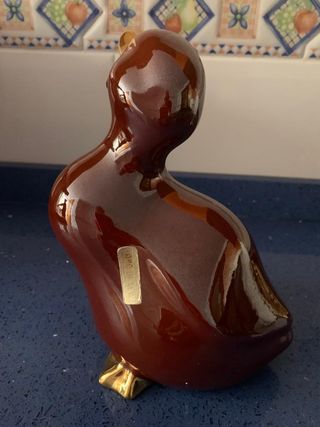Figura pato, detalles oro de ley