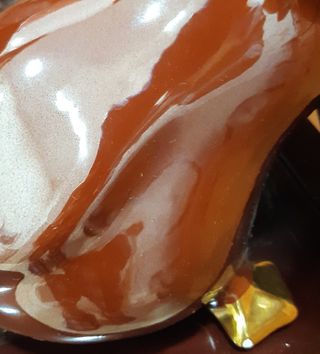 Figura pato, detalles oro de ley