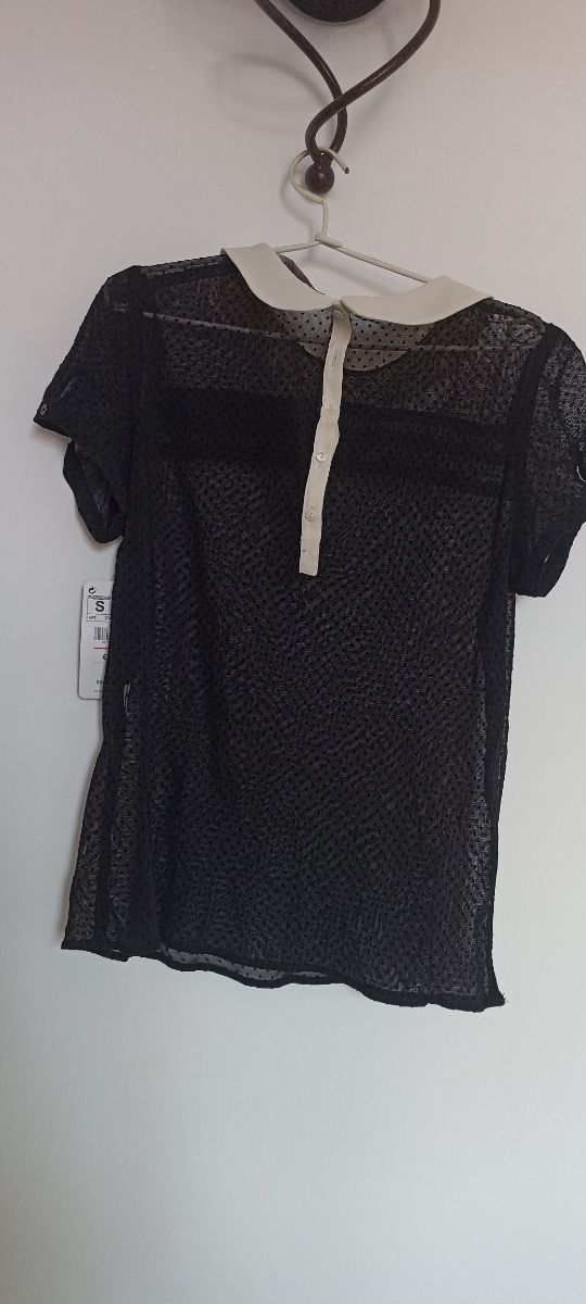 Blusa de Zara con etiqueta
