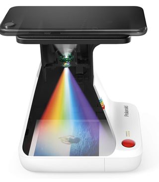 Camara de fotos Polaroid NUEVA + 4 paquet de fotos