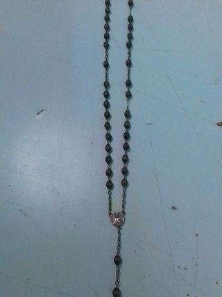 Rosario con las bolitas de madera
