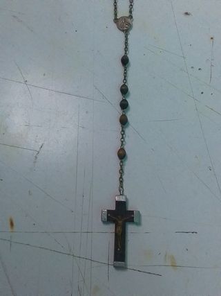 Rosario con las bolitas de madera