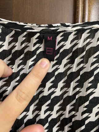 blusa blanca y negra