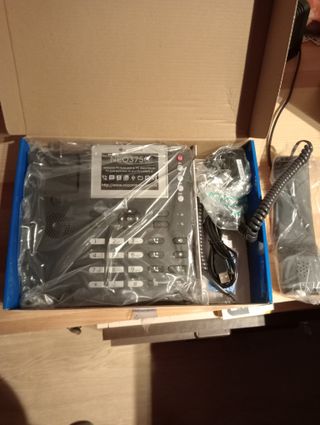 2 Telefonos , de Sim Fijos CoComm NEO03750 NU