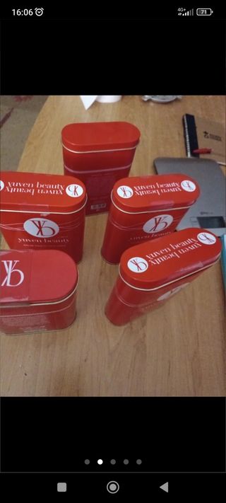 5 cajitas metálicas rojas perfumes