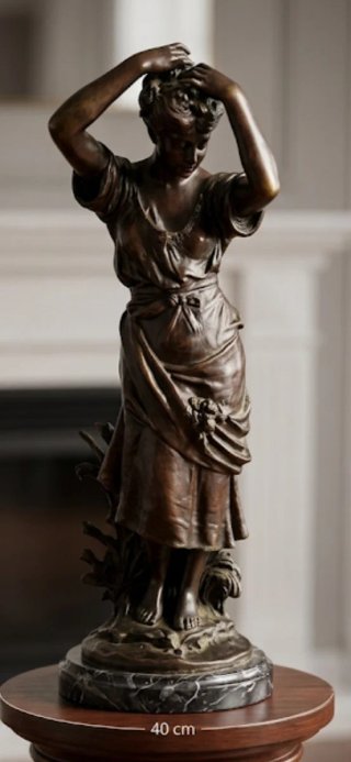 Figura de bronce