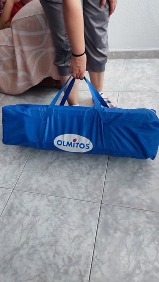 Cuna de viaje  cn un juego de sabanas 