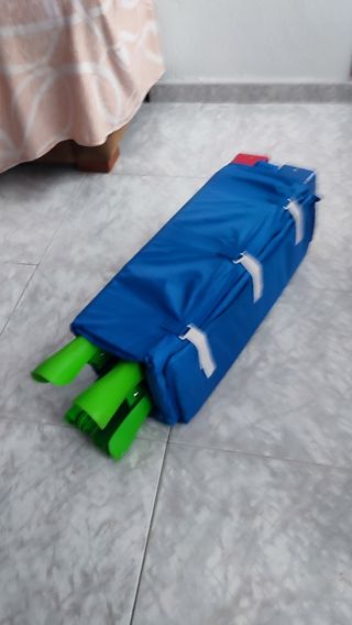 Cuna de viaje  cn un juego de sabanas 