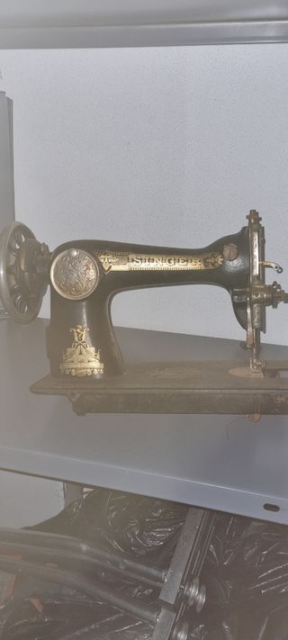 Máquina de coser singer antigua