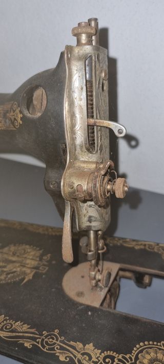 Máquina de coser singer antigua