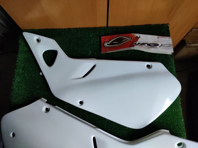 Tapas laterales Honda CR 97/99