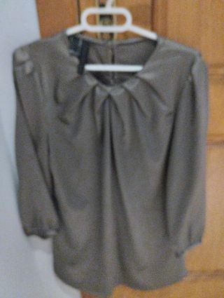Camisa plateada